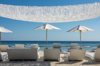 umbrellas and seats by the beach